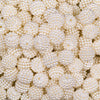 Close up view of a pile of 12mm Off White Ball Bead Chunky Acrylic Bubblegum Beads
