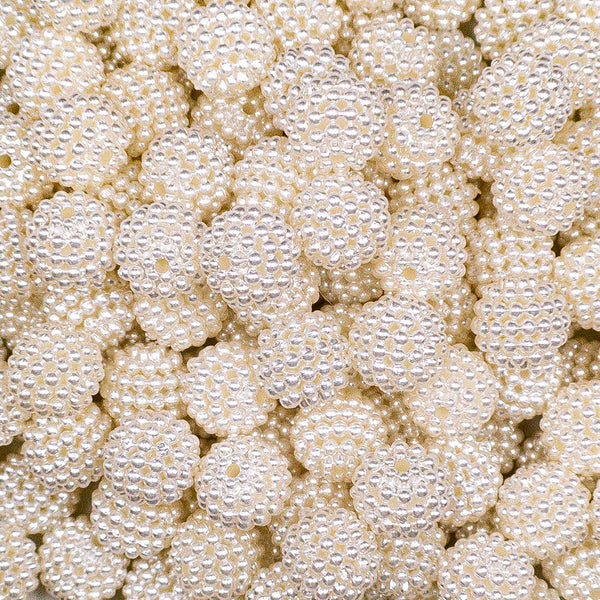 Close up view of a pile of 12mm Off White Ball Bead Chunky Acrylic Bubblegum Beads