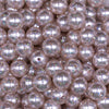 Close up view of a pile of 12mm Ivory with Glitter Faux Pearl Acrylic Bubblegum Beads - 20 Count