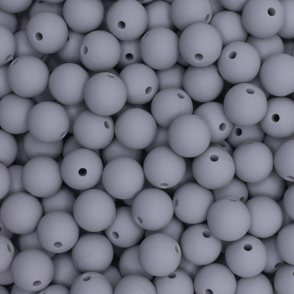 close up view of a pile of 12mm Light Gray Round Silicone Bead