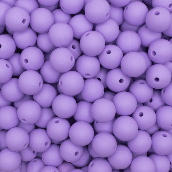 close up view of a pile of 12mm Light Purple Round Silicone Bead