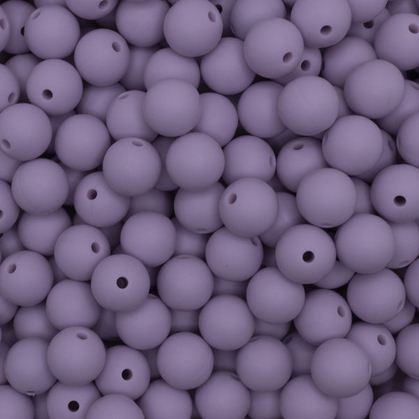 close up view of a pile of 12mm Lilac Purple Round Silicone Bead