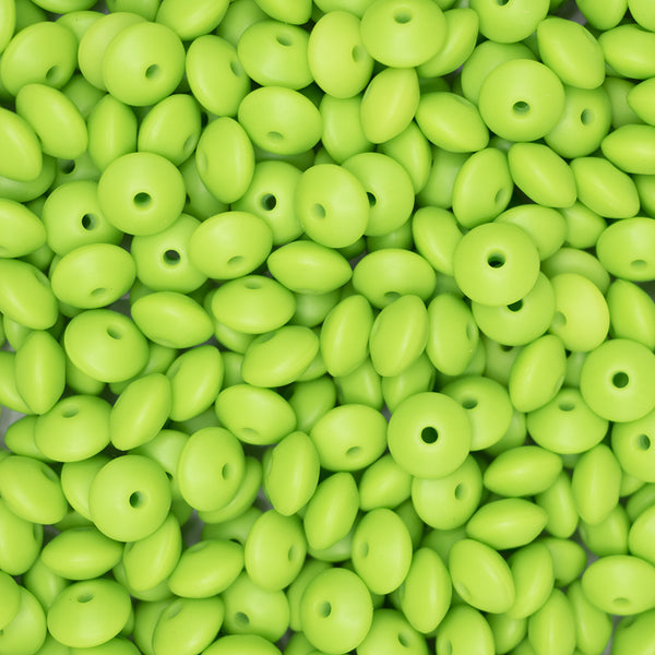 top view of a pile of 12mm Lime Green Lentil Silicone Bead