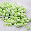 front view of a pile of 12mm Lime Green with White Stripes Resin Bubblegum Beads