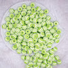top view of a pile of 12mm Lime Green with White Stripes Resin Bubblegum Beads