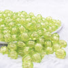 front view of a pile of 12mm Lime Green Transparent Pumpkin Shaped Bubblegum Beads