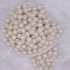 top view of a pile of 12mm Matte Ivory pearl Acrylic Bubblegum Beads