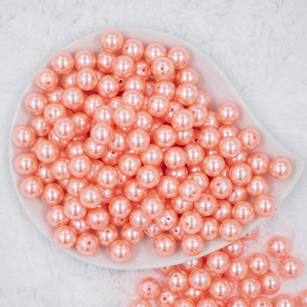 top view of a pile of 12mm Melon Orange Pearl Acrylic Bubblegum Beads [20 Count]