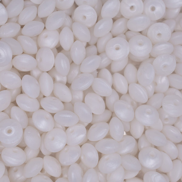 top view of a pile of 12mm Metallic White Lentil Silicone Bead