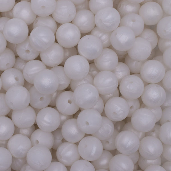 close up view of a pile of 12mm Metallic White Round Silicone Bead