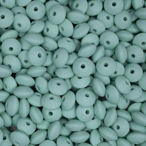 top view of a pile of 12mm Mint Green Lentil Silicone Bead