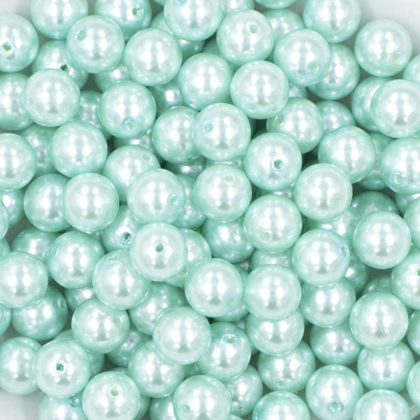 close up view of a pile of 12mm Mint Green Faux Pearl Acrylic Bubblegum Beads [20 Count]