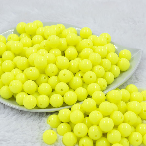 Front view of a pile of 12mm Neon Yellow Solid Acrylic Bubblegum Beads [20 & 50 Count]