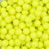 Close up view of a pile of 12mm Neon Yellow Solid Acrylic Bubblegum Beads [20 & 50 Count]