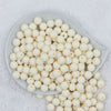 Top view of a pile of 12mm Off White Matte Acrylic Bubblegum Beads