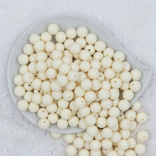 Top view of a pile of 12mm Off White Matte Acrylic Bubblegum Beads