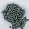 Top view of a pile of 12mm Olive Rhinestone AB Bubblegum Beads
