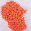 Top view of a pile of 12mm Orange Glow in the Dark Bubblegum Beads [20 & 50 Count]