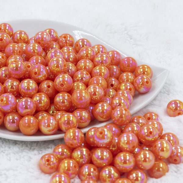 Front view of a pile of 12mm Orange Iridescent AB Solid Acrylic Bubblegum Beads [20 Count]