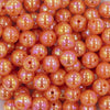 Close up view of a pile of 12mm Orange Iridescent AB Solid Acrylic Bubblegum Beads [20 Count]