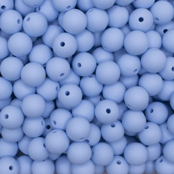 close up view of a pile of 12mm Pastel Blue Round Silicone Bead