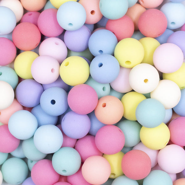 Close up view of a pile of 12MM Matte Pastel Solid Color Mix Acrylic Bubblegum Beads Bulk [Choose Count]