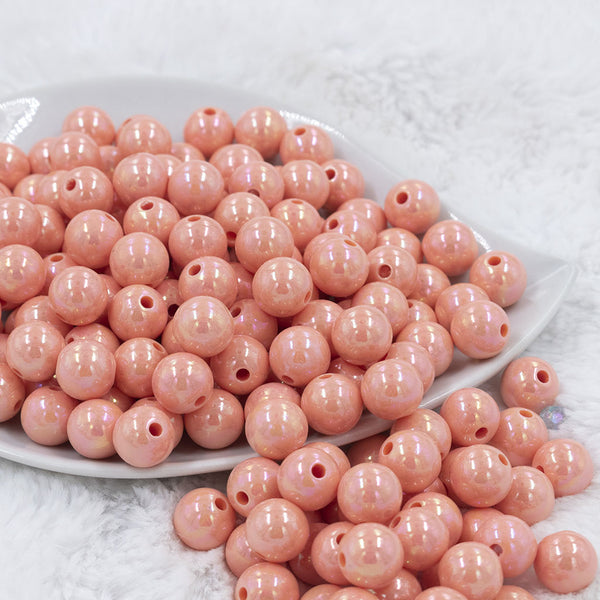 Front view of a pile of 12mm Peach AB Solid Acrylic Bubblegum Beads [20 Count]