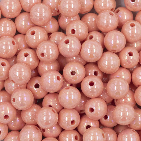 Close up view of a pile of 12mm Peach AB Solid Acrylic Bubblegum Beads [20 Count]