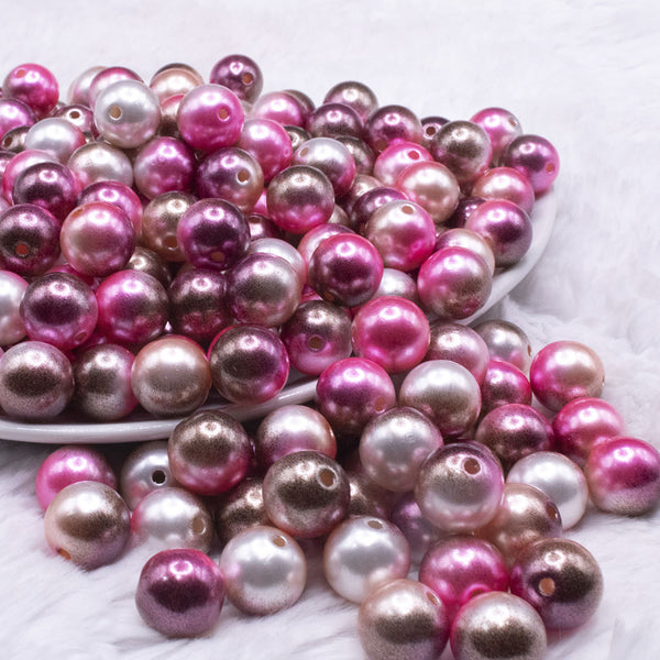 front view of a pile of 12mm Pink and Brown Ombre Shimmer Faux Pearl Bubblegum Beads