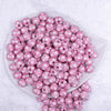 Top view of a pile of 12mm Pink with White Polka Dot Acrylic Chunky Bubblegum Beads