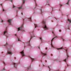 Close up view of a pile of 12mm Pink with White Polka Dot Acrylic Chunky Bubblegum Beads
