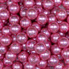Close up view of a pile of 12mm Pink with Glitter Faux Pearl Acrylic Bubblegum Beads - 20 Count