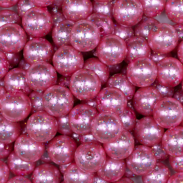 Close up view of a pile of 12mm Pink with Glitter Faux Pearl Acrylic Bubblegum Beads - 20 Count
