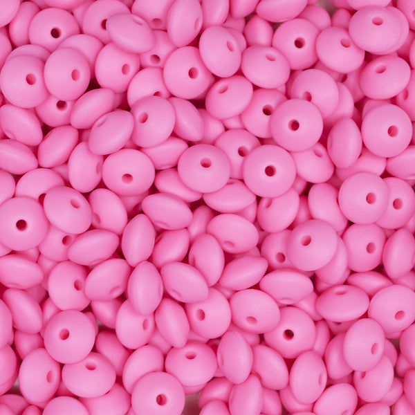 top view of a pile of 12mm Pink Lentil Silicone Bead