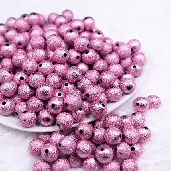 Front view of a pile of 12mm Pink Stardust Bubblegum Beads [20 Count]