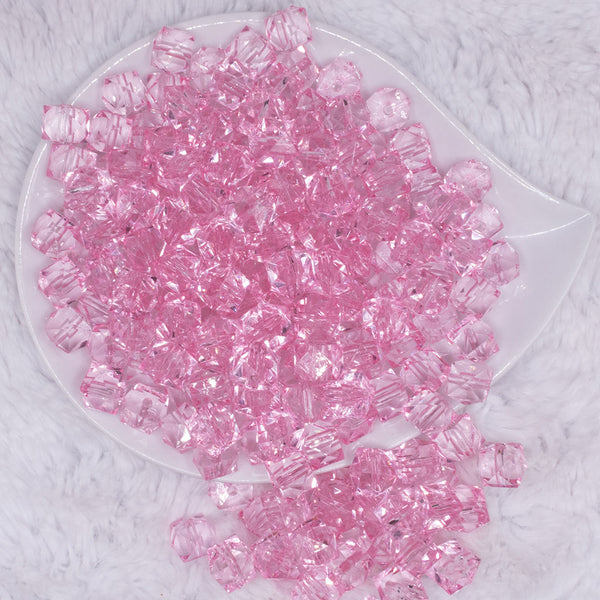 top view of a pile of 12mm Pink Transparent Cube Faceted Bubblegum Beads
