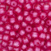 CLOSE UP view of a pile of 12mm Pink Transparent Pumpkin Shaped Bubblegum Beads