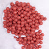 top view of a pile of 12mm Pink Watermelon Seeds Bubblegum Beads