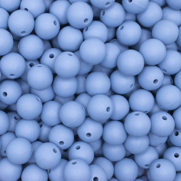close up view of a pile of 12mm Powder Blue Round Silicone Bead