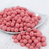 Front view of a pile of 12mm Punch Pink Matte Acrylic Bubblegum Beads