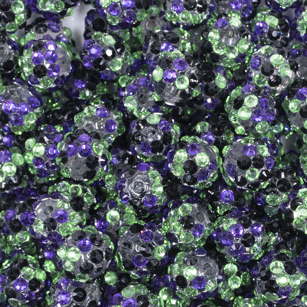 close up view of a pile of 12mm Purple, Green & Black Confetti Rhinestone AB Bubblegum Beads