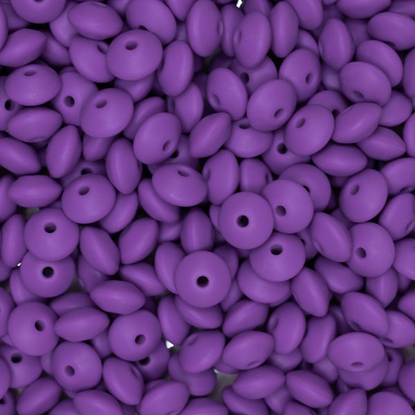 top view of a pile of 12mm Purple Lentil Silicone Bead