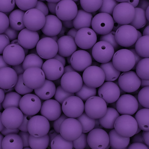 close up view of a pile of 12mm Purple Round Silicone Bead