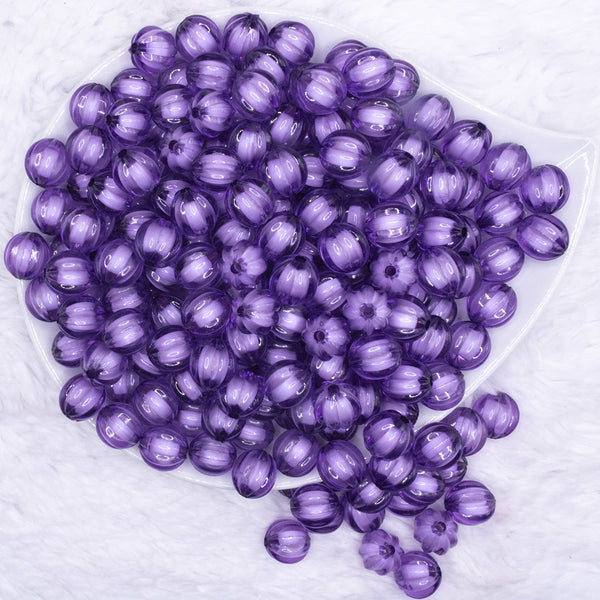 top view of a pile of 12mm Purple Transparent Pumpkin Shaped Bubblegum Beads