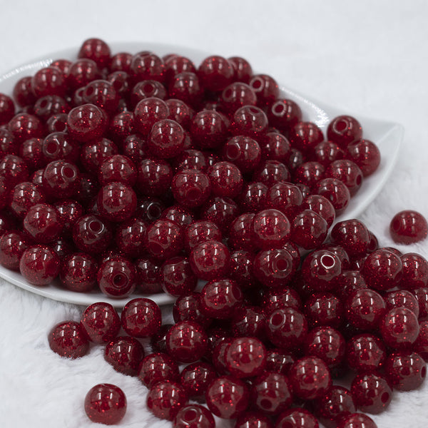 Front view of a pile of 12mm Red Glitter Sparkle Chunky Acrylic Bubblegum Beads - 20 Count