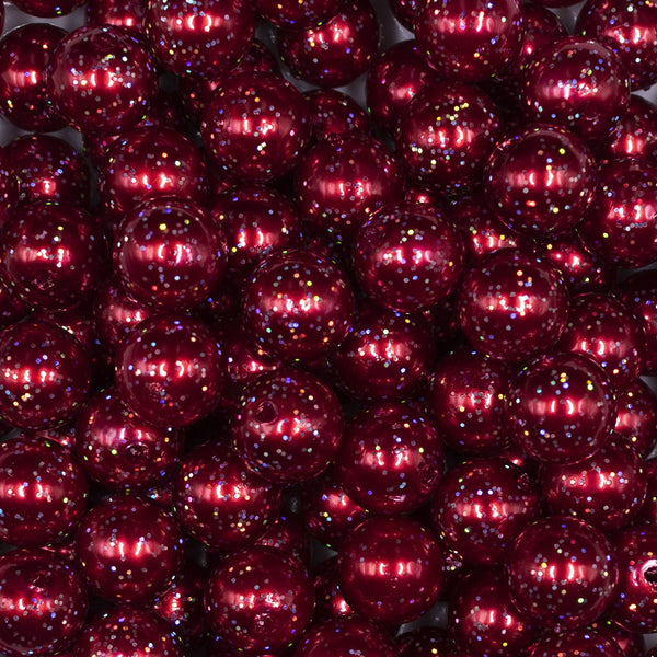 Close up view of a pile of 12mm Red with Glitter Faux Pearl Acrylic Bubblegum Beads - 20 Count