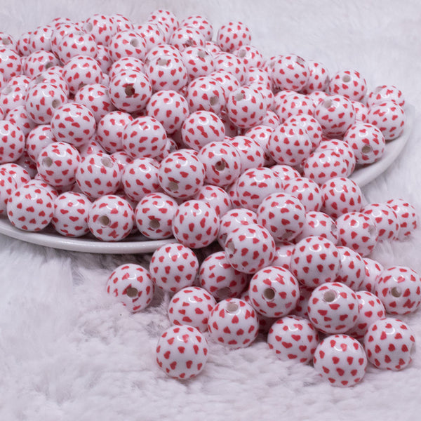 front view of a pile of 12mm Red Confetti Hearts on White Chunky Acrylic Bubblegum Beads - 20 Count
