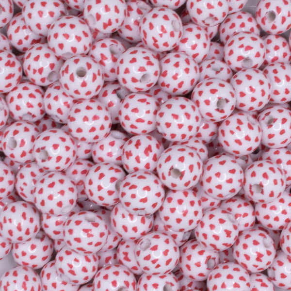 close up view of a pile of 12mm Red Confetti Hearts on White Chunky Acrylic Bubblegum Beads - 20 Count