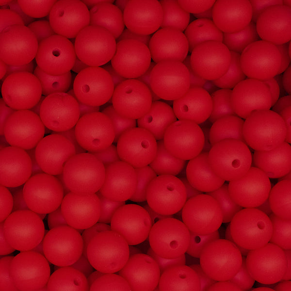 close up view of a pile of 12mm Red Round Silicone Bead