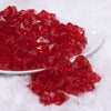 front view of a pile of 12mm Red Transparent Cube Faceted Bubblegum Beads